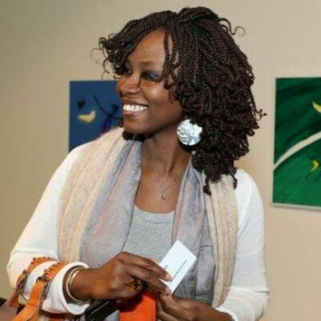 Portrait of Candide Netchenawoe, founder of Mary's Consulting