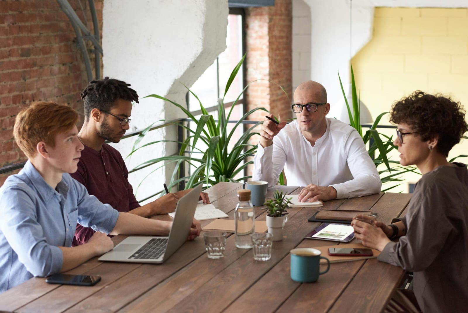 A team discussing priorities and decisions in a working session.